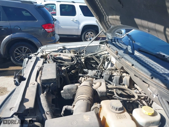 2014 Ford F-150 XL with VIN 1FTMF1CM4EKG22844, listed as a IAAI auction lot 41669259 with 242,141 mi miles. Bid and sale history available at carsss.com. Image 9.