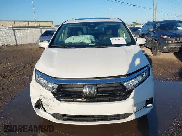 2022 Honda Odyssey Touring with VIN 5FNRL6H85NB058948, listed as a IAAI auction lot 42579157 with 53,669 mi miles and . Bid and sale history available at DreamBid. Image 12.