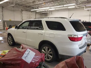 2013 Dodge Durango Crew with VIN 1C4SDJDT1DC540680, listed as a IAAI auction lot 41649262 with 106,016 mi miles. Bid and sale history available at carsss.com. Image 3.