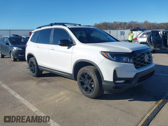 2023 Honda Passport TrailSport z VIN 5FNYF8H68PB007654, wystawiony jako IAAI lot #40816118 z przebiegiem 35 656 mil mil oraz . Historia ofert i sprzedaży dostępna na DreamBid. Obrazek 1.