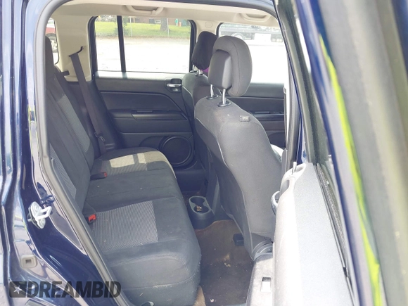 2016 Jeep Patriot Sport with VIN 1C4NJPBAXGD670093, listed as a IAAI auction lot 42429998 with 165,763 mi miles and . Bid and sale history available at DreamBid. Image 8.