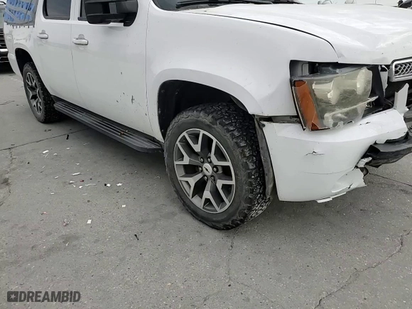 2012 Chevrolet Suburban LT with VIN 1GNSCJE08CR251841, listed as a Copart auction lot 83227314 with 0 mi miles and Salvage Title. Bid and sale history available at carsss.com. Image 11.