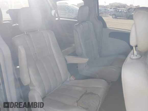 2012 Chrysler Town & Country Touring z VIN 2C4RC1BGXCR410507, wystawiony jako IAAI lot #41215704 z przebiegiem 161 501 mil mil oraz . Historia ofert i sprzedaży dostępna na DreamBid. Obrazek 8.