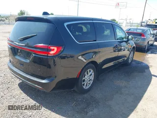 2023 Chrysler Pacifica Touring L with VIN 2C4RC1BG9PR628170, listed as a IAAI auction lot 42515590 with 41,987 mi miles and . Bid and sale history available at DreamBid. Image 4.