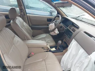 1997 Toyota Avalon XL with VIN 4T1BF12B1VU198756, listed as a IAAI auction lot 41613887 with 217,863 mi miles. Bid and sale history available at carsss.com. Image 5.