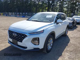 2019 Hyundai Santa Fe SE with VIN 5NMS2CAD0KH098259, listed as a IAAI auction lot 42075356 with 55,163 mi miles and . Bid and sale history available at DreamBid. Image 2.