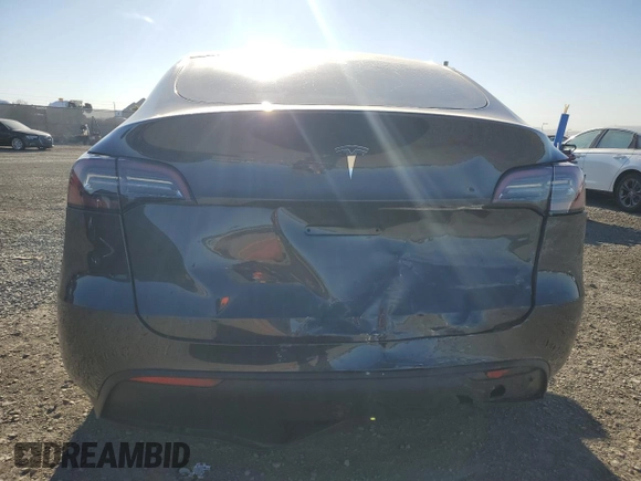 2024 Tesla Model Y with VIN 7SAYGDED4RF017614, listed as a Copart auction lot 88494625 with 11,209 mi miles and Salvage title. Bid and sale history available at DreamBid. Image 6.