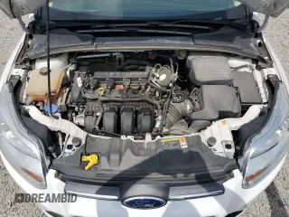 2013 Ford Focus SE z VIN 1FADP3F29DL374088, wystawiony jako Copart lot #59585135 z przebiegiem 74 997 mil mil oraz Szkoda całkowita • Salvage title. Historia ofert i sprzedaży dostępna na DreamBid. Obrazek 11.