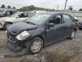 2011 Nissan Versa S with VIN 3N1BC1AP9BL422097, listed as a Copart auction lot 61122105 with 129,884 mi miles and Salvage title. Bid and sale history available at DreamBid. Image 1.
