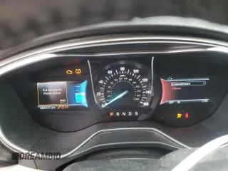2017 Ford Fusion SE z VIN 3FA6P0H97HR166462, wystawiony jako Copart lot #86265204 z przebiegiem 65 707 mil mil oraz Szkoda całkowita • Salvage title. Historia ofert i sprzedaży dostępna na DreamBid. Obrazek 9.