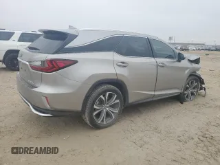 2021 Lexus RX 350L with VIN JTJHZKEA3M2022121, listed as a Copart auction lot 83263024 with 39,684 mi miles and Salvage title. Bid and sale history available at DreamBid. Image 3.