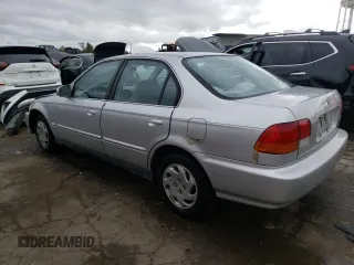 1997 Honda Civic EX with VIN 1HGEJ8647VL018949, listed as a Copart auction lot 72557904 with 162,531 mi miles and Salvage Title. Bid and sale history available at carsss.com. Image 2.