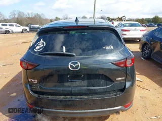 2020 Mazda CX-5 Touring z VIN JM3KFBCMXL1741182, wystawiony jako IAAI lot #41602315 z przebiegiem 31 582 mil mil oraz . Historia ofert i sprzedaży dostępna na DreamBid. Obrazek 17.