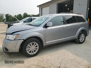 2017 Dodge Journey SXT with VIN 3C4PDCBG5HT599636, listed as a Copart auction lot 60121895 with 54,659 mi miles and Salvage title. Bid and sale history available at DreamBid. Image 1.