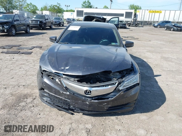 2015 Acura TLX with VIN 19UUB1F34FA026219, listed as a IAAI auction lot 42240969 with 84,617 mi miles and . Bid and sale history available at DreamBid. Image 6.