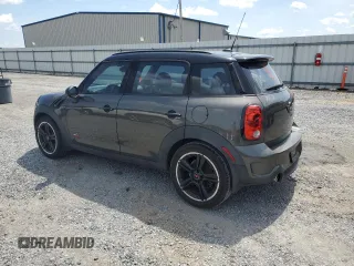 2012 MINI Countryman S with VIN WMWZC5C5XCWL56232, listed as a Copart auction lot 60298705 with 140,425 mi miles and Salvage title. Bid and sale history available at DreamBid. Image 2.