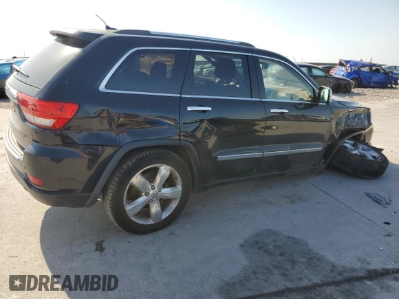 2013 Jeep Grand Cherokee Overland with VIN 1C4RJECT8DC556536, listed as a Copart auction lot 52758795 with 67,123 mi miles and Salvage Title. Bid and sale history available at carsss.com. Image 3.