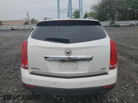 2013 Cadillac SRX Performance Collection with VIN 3GYFNHE34DS597871, listed as a Copart auction lot 56470795 with 208,504 mi miles and Salvage title. Bid and sale history available at DreamBid. Image 6.