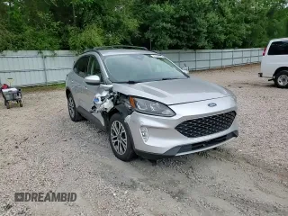 2020 Ford Escape SEL z VIN 1FMCU9H66LUB44403, wystawiony jako Copart lot #57934925 z przebiegiem Nie podano mil oraz Szkoda całkowita • Salvage title. Historia ofert i sprzedaży dostępna na DreamBid. Obrazek 14.