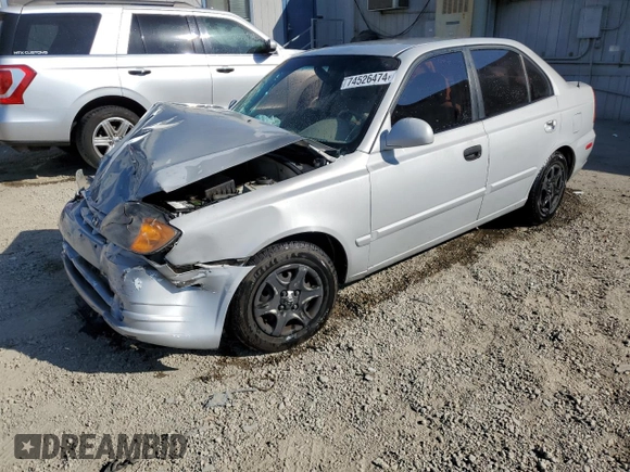2004 Hyundai Accent GL with VIN KMHCG45C74U550647, listed as a Copart auction lot 74526474 with 115,838 mi miles and Salvage Title. Bid and sale history available at carsss.com. Image 1.