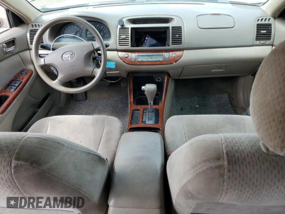 2003 Toyota Camry LE with VIN 4T1BE32K83U241744, listed as a Copart auction lot 55866025 with 200,685 mi miles and Salvage Title. Bid and sale history available at DreamBid. Image 8.