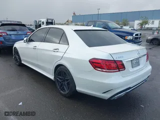 2014 Mercedes-Benz E-Class E 350 Luxury with VIN WDDHF8JB0EA850671, listed as a IAAI auction lot 41935999 with 139,386 mi miles. Bid and sale history available at carsss.com. Image 6.