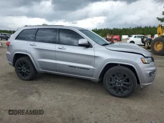 2018 Jeep Grand Cherokee Altitude with VIN 1C4RJEAG9JC246753, listed as a Copart auction lot 54497745 with 121,665 mi miles and Salvage title. Bid and sale history available at DreamBid. Image 4.