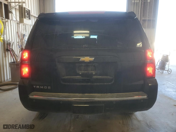 2015 Chevrolet Tahoe LTZ with VIN 1GNSCCKC1FR107904, listed as a Copart auction lot 46623105 with 191,793 mi miles and Salvage Title. Bid and sale history available at carsss.com. Image 6.