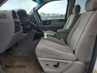 2007 GMC Envoy SLE z VIN 1GKDT13SX72165911, wystawiony jako Copart lot #47059805 z przebiegiem 168 377 mil mil oraz Szkoda całkowita • Salvage title. Historia ofert i sprzedaży dostępna na DreamBid. Obrazek 7.