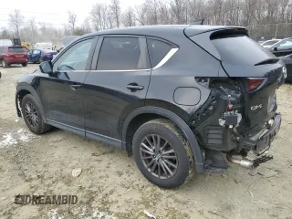 2020 Mazda CX-5 Touring with VIN JM3KFACM1L0767976, listed as a Copart auction lot 46299715 with 148,137 mi miles and Salvage Title. Bid and sale history available at carsss.com. Image 2.