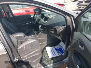 2014 Ford Escape Titanium with VIN 1FMCU9J98EUB66961, listed as a IAAI auction lot 42057914 with 101,943 mi miles. Bid and sale history available at carsss.com. Image 5.
