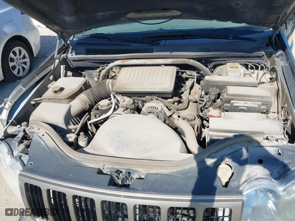 2005 Jeep Grand Cherokee Laredo with VIN 1J4HR48N35C647637, listed as a IAAI auction lot 38514345 with 167,342 mi miles. Bid and sale history available at carsss.com. Image 10.
