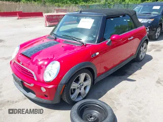 2006 MINI Convertible S with VIN WMWRH33586TK59381, listed as a IAAI auction lot 42165953 with 94,109 mi miles and . Bid and sale history available at DreamBid. Image 2.