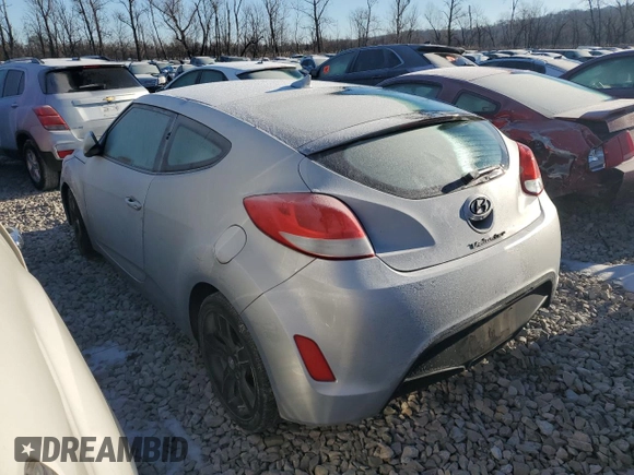 2015 Hyundai Veloster z VIN KMHTC6AD9FU236037, wystawiony jako Copart lot #43710405 z przebiegiem 130 254 mil mil oraz Czysty tytuł • Clean title. Historia ofert i sprzedaży dostępna na DreamBid. Obrazek 2.
