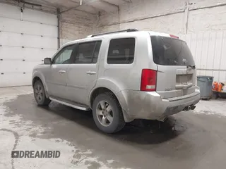 2011 Honda Pilot EX-L with VIN 5FNYF4H66BB029802, listed as a IAAI auction lot 42101545 with 240,127 mi miles and . Bid and sale history available at carsss.com. Image 3.