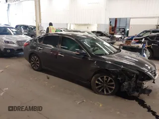 2016 Nissan Altima S with VIN 1N4AL3AP3GC120284, listed as a IAAI auction lot 41838142 with 97,636 mi miles and . Bid and sale history available at DreamBid. Image 14.