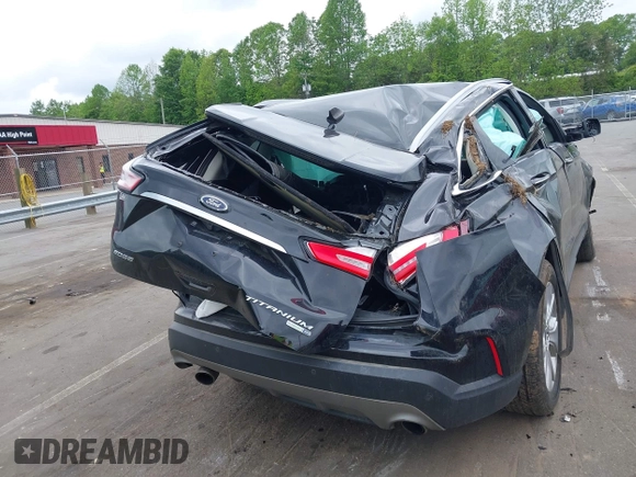2020 Ford Edge Titanium z VIN 2FMPK4K98LBB12684, wystawiony jako IAAI lot #42134532 z przebiegiem 103 786 mil mil oraz . Historia ofert i sprzedaży dostępna na DreamBid. Obrazek 16.