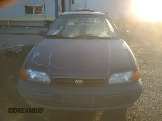 1996 Toyota Tercel DX z VIN JT2AC52L5T0190097, wystawiony jako Copart lot #76574844 z przebiegiem 175 256 mil mil oraz Tytuł czysty. Historia ofert i sprzedaży dostępna na DreamBid. Obrazek 5.