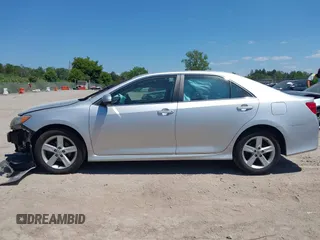2014 Toyota Camry L with VIN 4T1BF1FK1EU414194, listed as a IAAI auction lot 42807873 with 108,994 mi miles and . Bid and sale history available at DreamBid. Image 15.