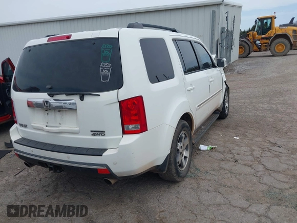 2009 Honda Pilot Touring with VIN 5FNYF48929B032510, listed as a IAAI auction lot 41945923 with 236,256 mi miles and . Bid and sale history available at carsss.com. Image 4.