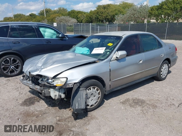 2002 Honda Accord LX z VIN JHMCG56462C005400, wystawiony jako IAAI lot #41893400 z przebiegiem Nie podano mil oraz . Historia ofert i sprzedaży dostępna na DreamBid. Obrazek 18.