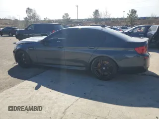 2013 BMW M5 with VIN WBSFV9C50DC773250, listed as a Copart auction lot 45922965 with 96,246 mi miles and Salvage Title. Bid and sale history available at carsss.com. Image 2.