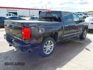 2014 Chevrolet Silverado 1500 High Country with VIN 3GCUKTEC8EG399193, listed as a IAAI auction lot 41789709 with 207,890 mi miles. Bid and sale history available at carsss.com. Image 4.