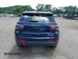 2021 Jeep Compass Trailhawk with VIN 3C4NJDDB0MT590442, listed as a IAAI auction lot 42543530 with 66,669 mi miles and . Bid and sale history available at DreamBid. Image 16.