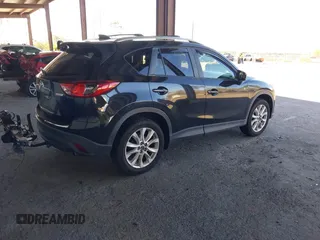 2013 Mazda CX-5 Grand Touring with VIN JM3KE2DE4D0127827, listed as a IAAI auction lot 41817214 with 108,295 mi miles. Bid and sale history available at carsss.com. Image 4.
