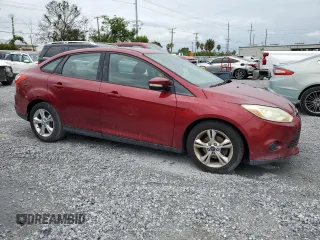 2013 Ford Focus SE with VIN 1FADP3F25DL284498, listed as a Copart auction lot 63040795 with 116,700 mi miles and Clean title. Bid and sale history available at DreamBid. Image 4.