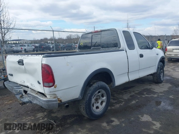 1999 Ford F-150 с VIN 1FTRX18W2XNB30523, выставлен на аукционе IAAI как лот 41617531 с пробегом 319 673 миль миль и . История ставок и продаж доступна на DreamBid. Изображение 4.