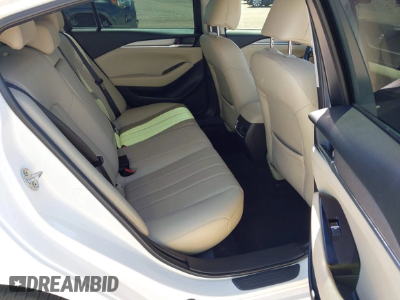 2021 Mazda 6 Touring with VIN JM1GL1VM4M1618686, listed as a IAAI auction lot 42079730 with 55,539 mi miles and . Bid and sale history available at DreamBid. Image 8.