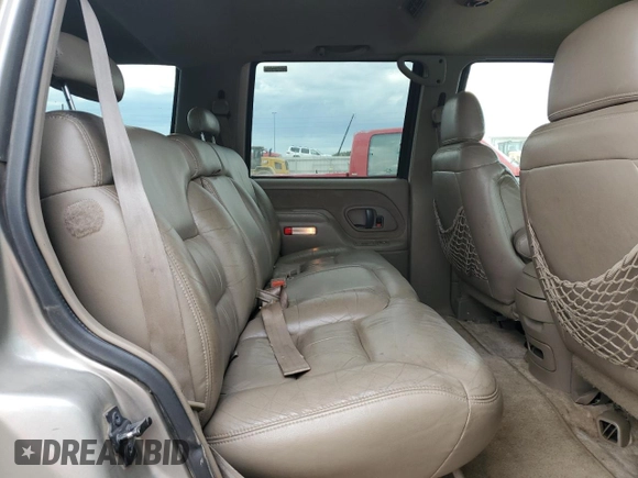 1999 GMC Yukon with VIN 1GKEK13R9XJ787877, listed as a Copart auction lot 72185044 with 191,710 mi miles and Salvage Title. Bid and sale history available at carsss.com. Image 11.