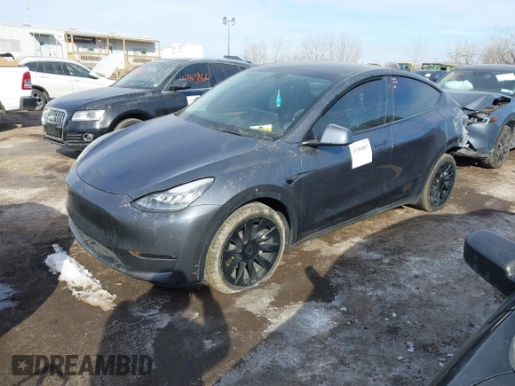 2022 Tesla Model Y Long Range z VIN 7SAYGDEE6NA013757, wystawiony jako IAAI lot #41364867 z przebiegiem 33 621 mil mil oraz . Historia ofert i sprzedaży dostępna na DreamBid. Obrazek 2.